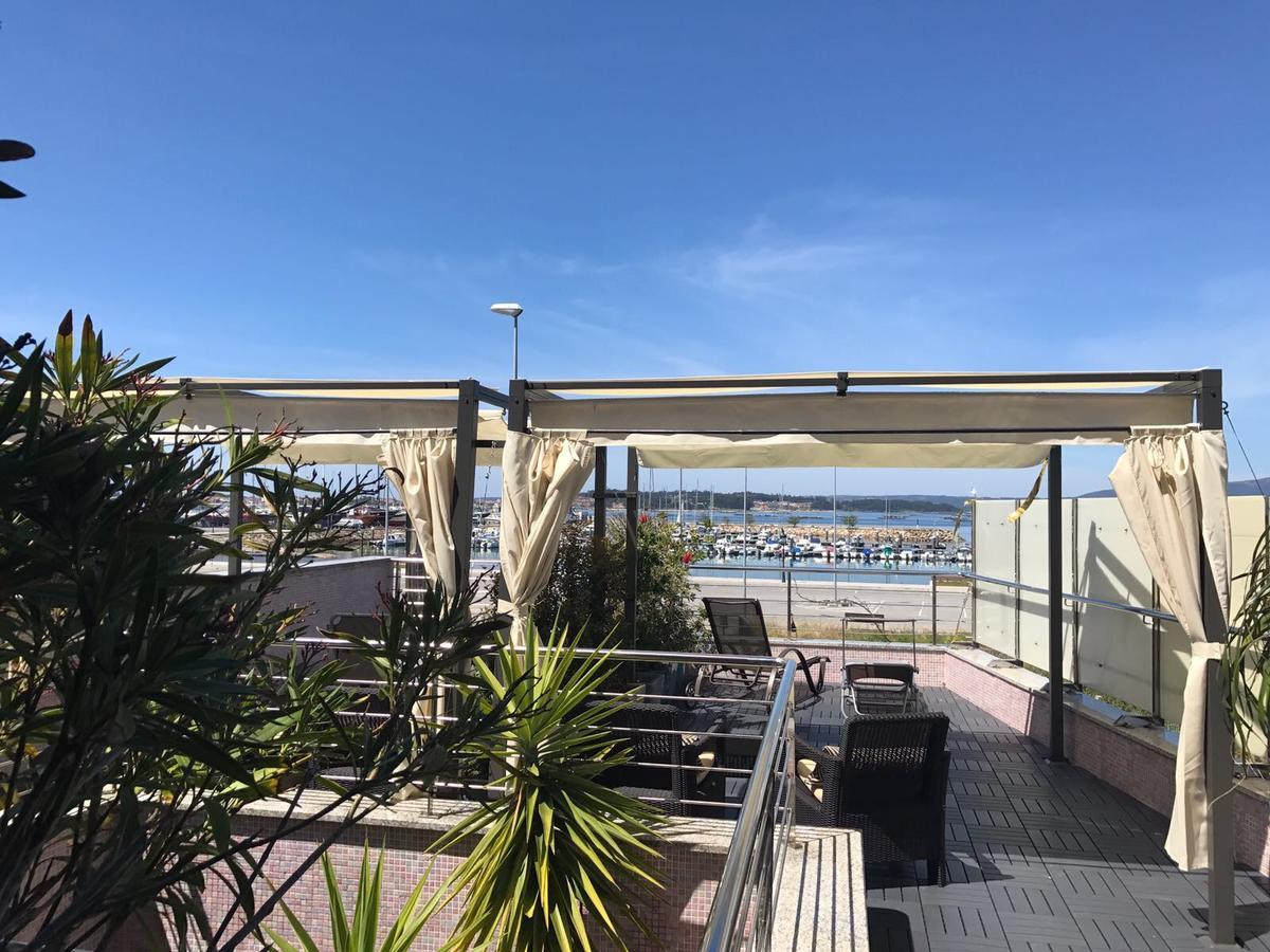 Apartamentos Puerto Basella Вилануева де Ароса Екстериор снимка