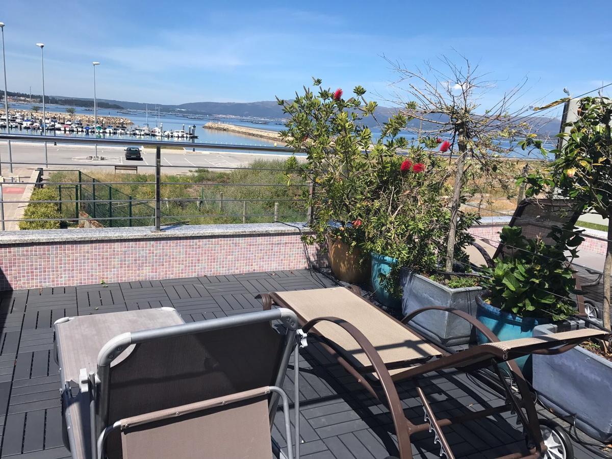 Apartamentos Puerto Basella Вилануева де Ароса Екстериор снимка