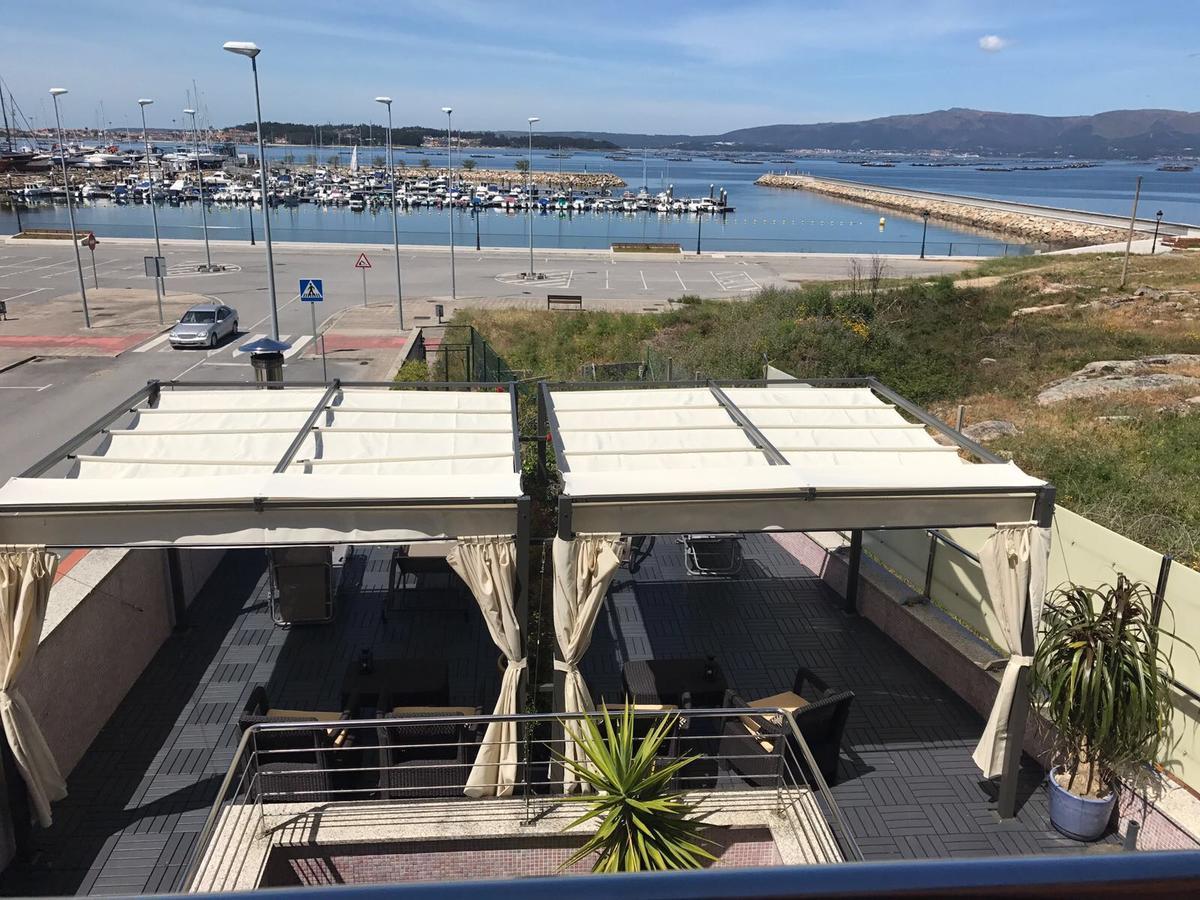 Apartamentos Puerto Basella Вилануева де Ароса Екстериор снимка