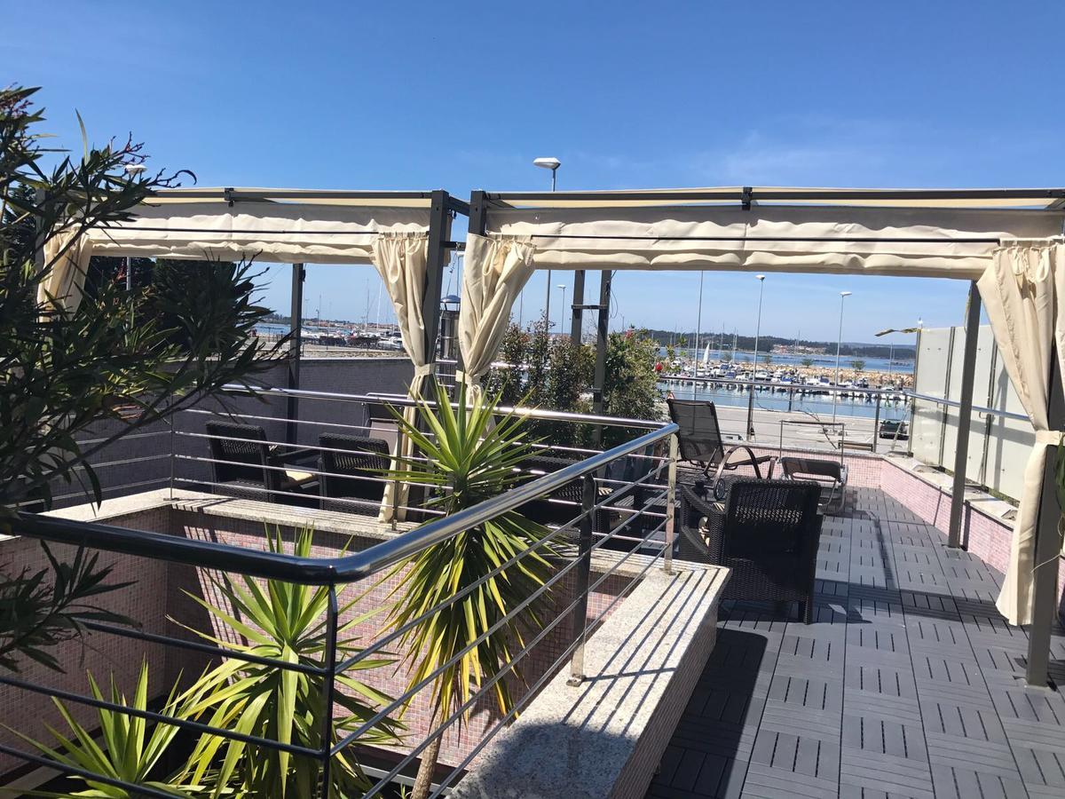 Apartamentos Puerto Basella Вилануева де Ароса Екстериор снимка