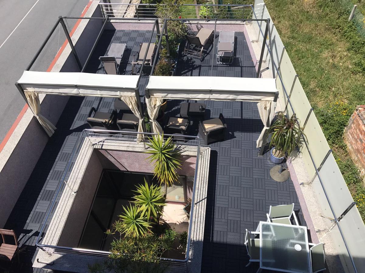 Apartamentos Puerto Basella Вилануева де Ароса Екстериор снимка