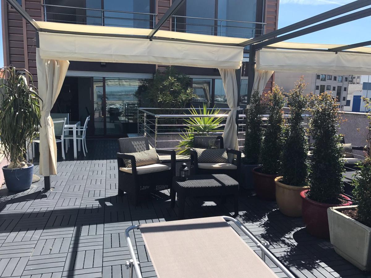 Apartamentos Puerto Basella Вилануева де Ароса Екстериор снимка