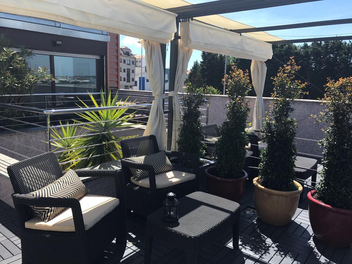 Apartamentos Puerto Basella Вилануева де Ароса Екстериор снимка